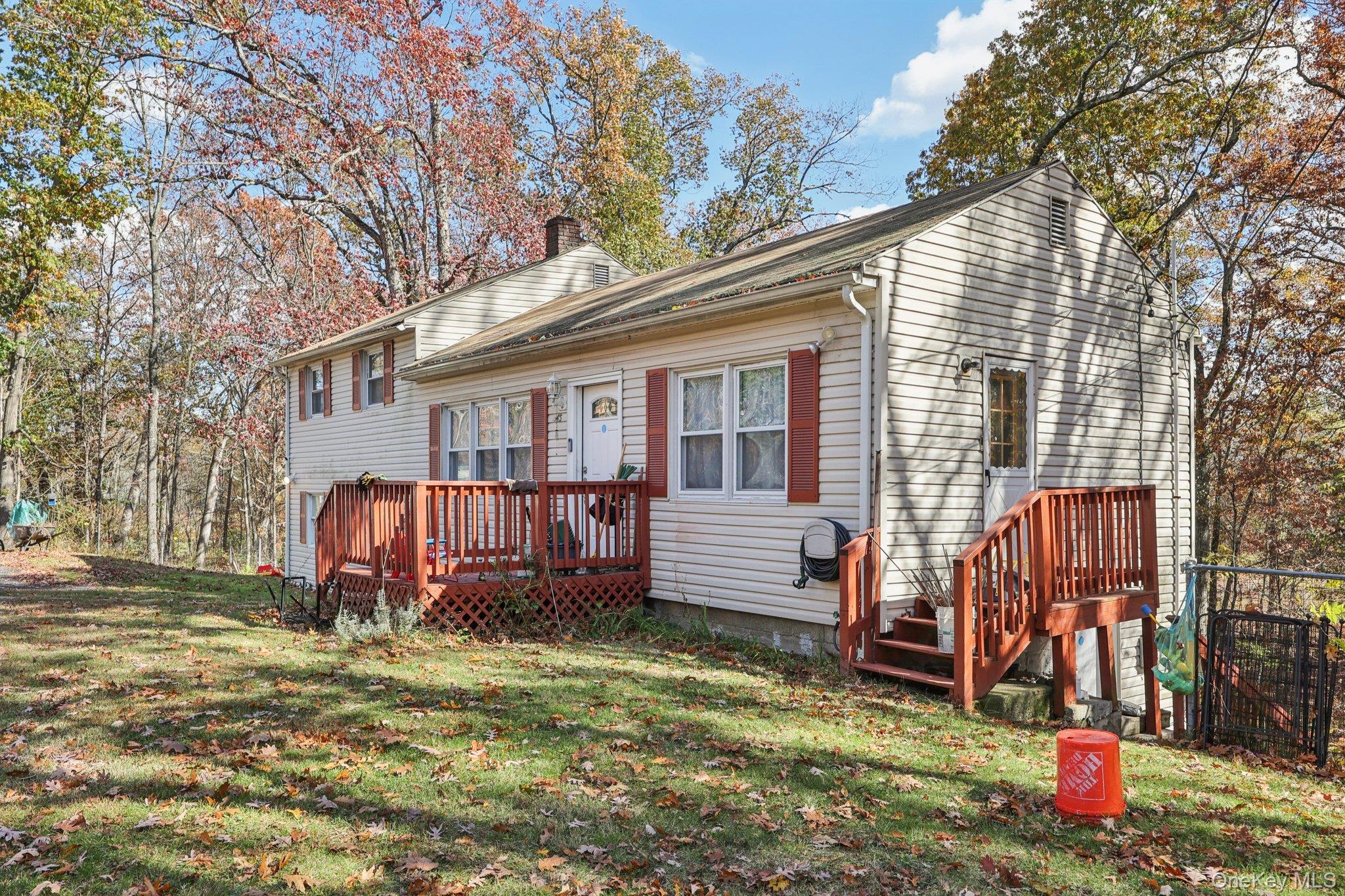 45 East Green Road Rock Tavern, NY 12575 - Photo 2 of 29 a view of a house with backyard and wooden fence