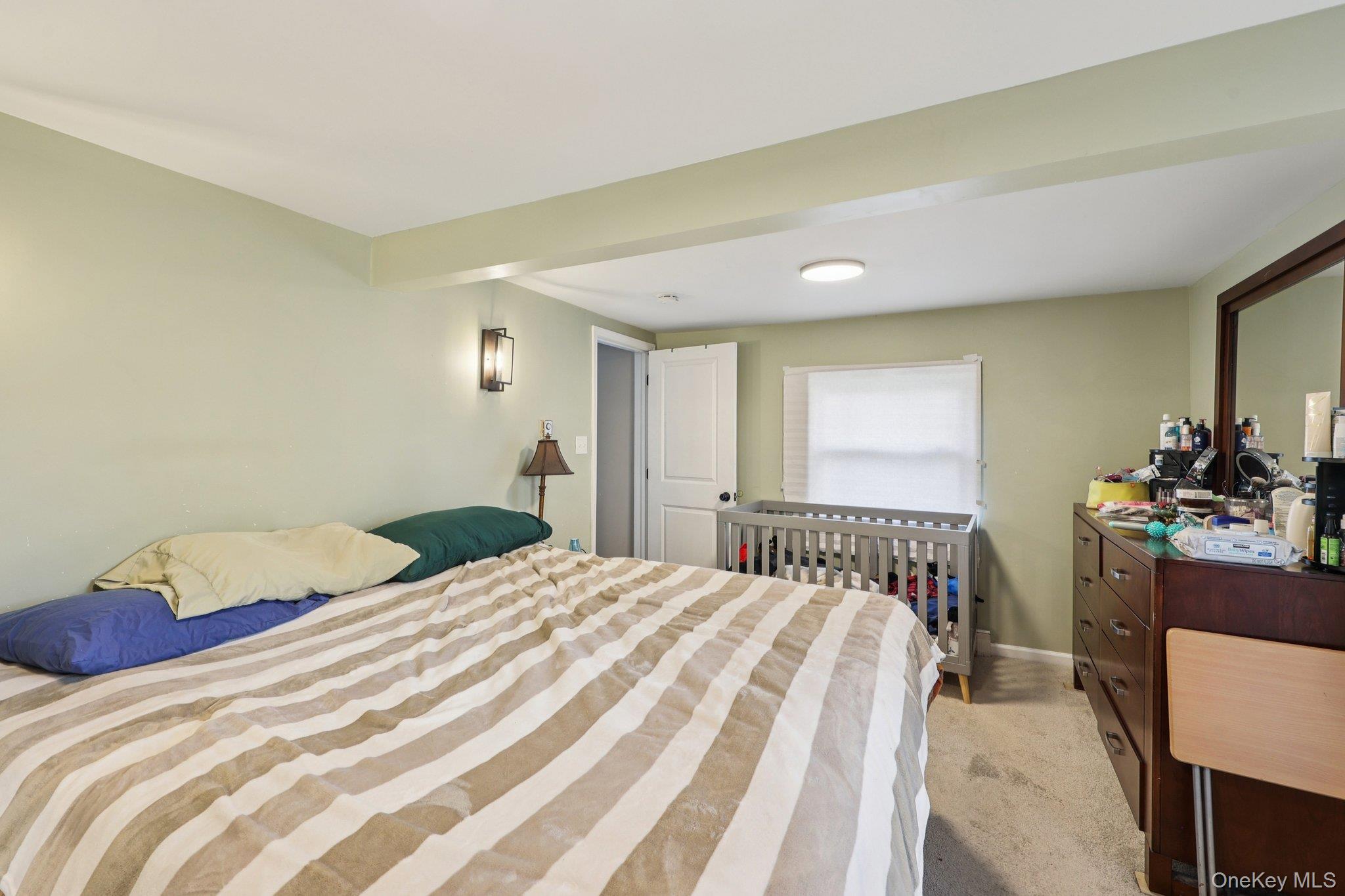 45 East Green Road Rock Tavern, NY 12575 - Photo 7 of 29 a bedroom with a bed and a dresser