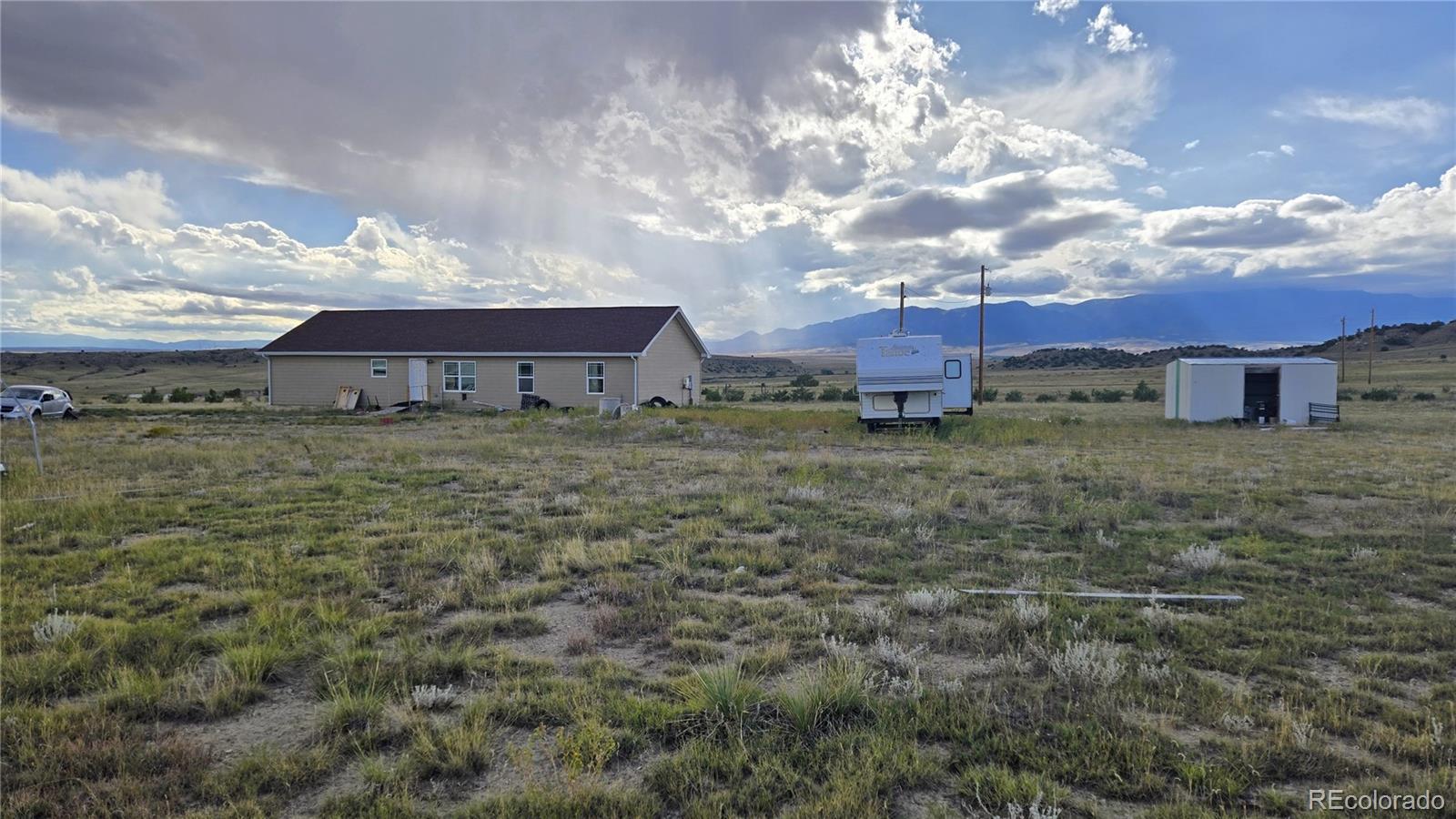 1428 Carlson Road Rye, CO 81069 - Photo 13 of 20 a view of a house with a yard