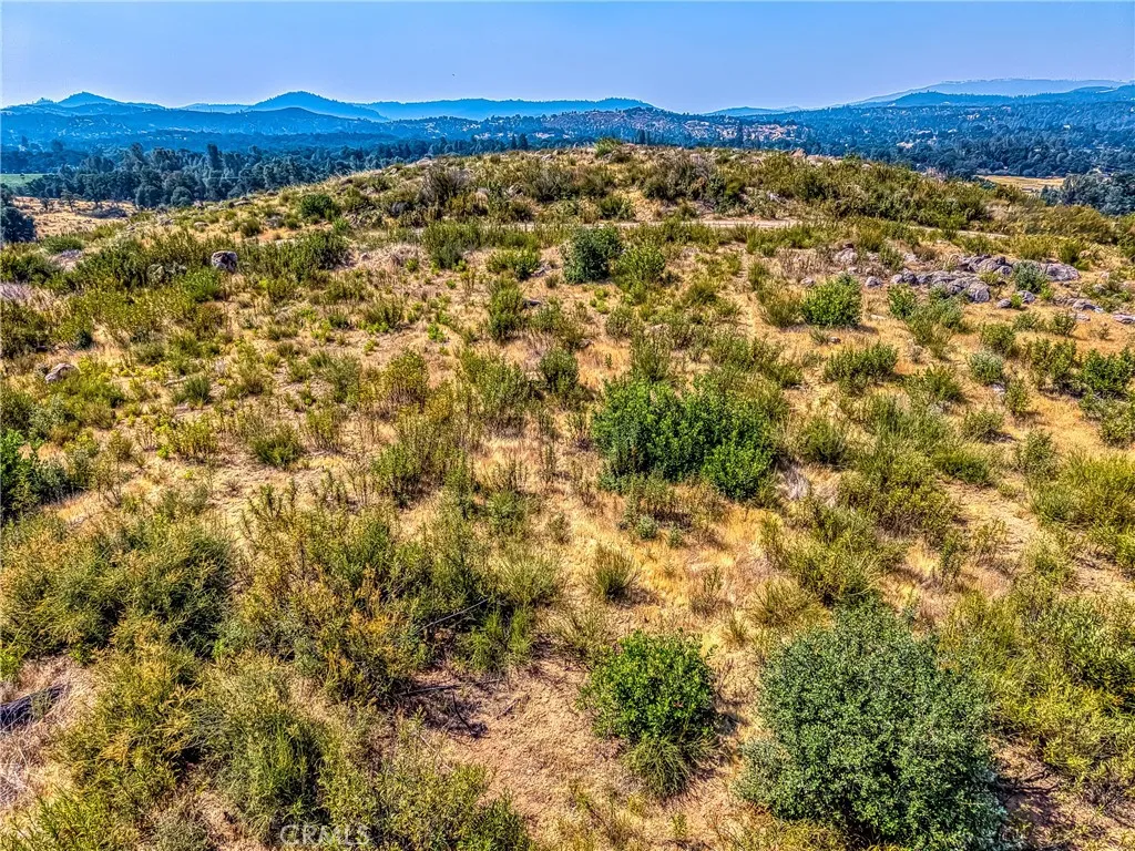 16462 5th Clearlake, CA 95422 - Photo 13 of 16 a view of a field with a mountain in the background