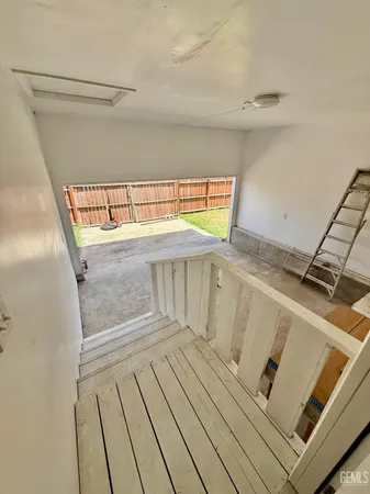 a view of wooden floor and staircase
