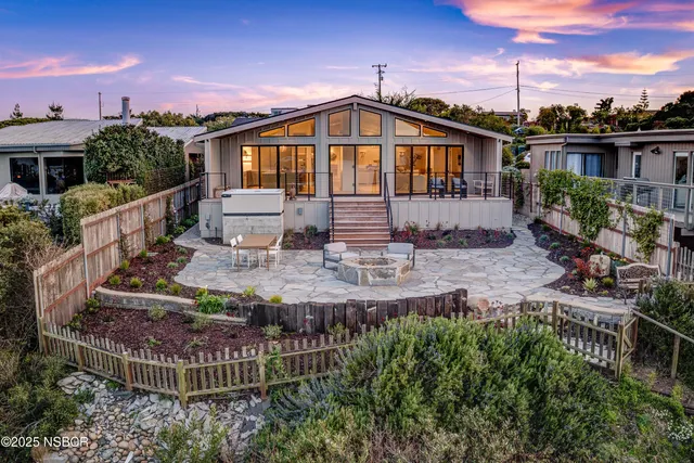 a view of a balcony with chairs