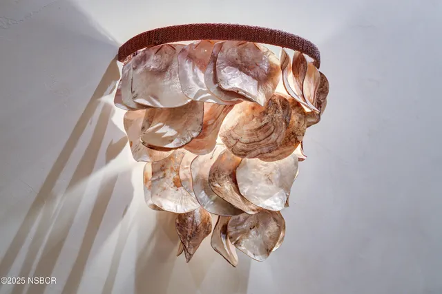 a spacious bathroom with a bathtub and a double vanity sink