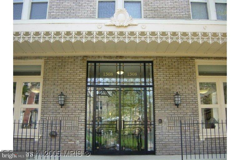 1308 Clifton Street Northwest, Unit 404 Washington, DC 20009 - Photo 2 of 14 a front view of a building