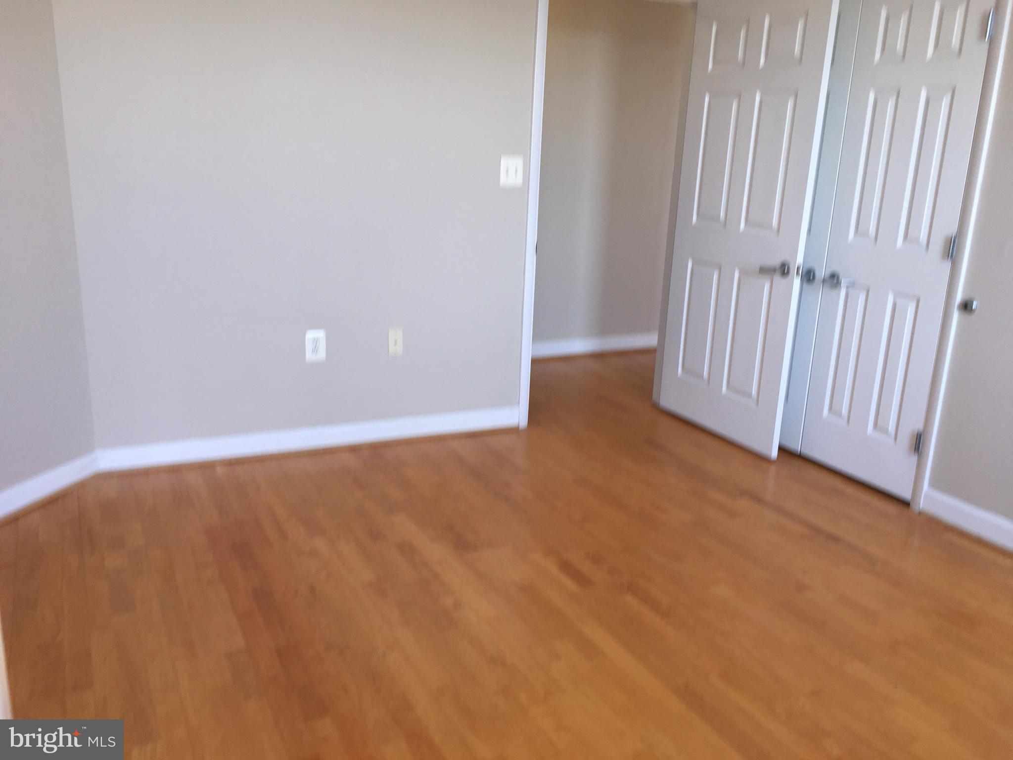 1308 Clifton Street Northwest, Unit 404 Washington, DC 20009 - Photo 7 of 14 a view of an empty room