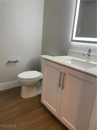 a bathroom with a sink and a toilet