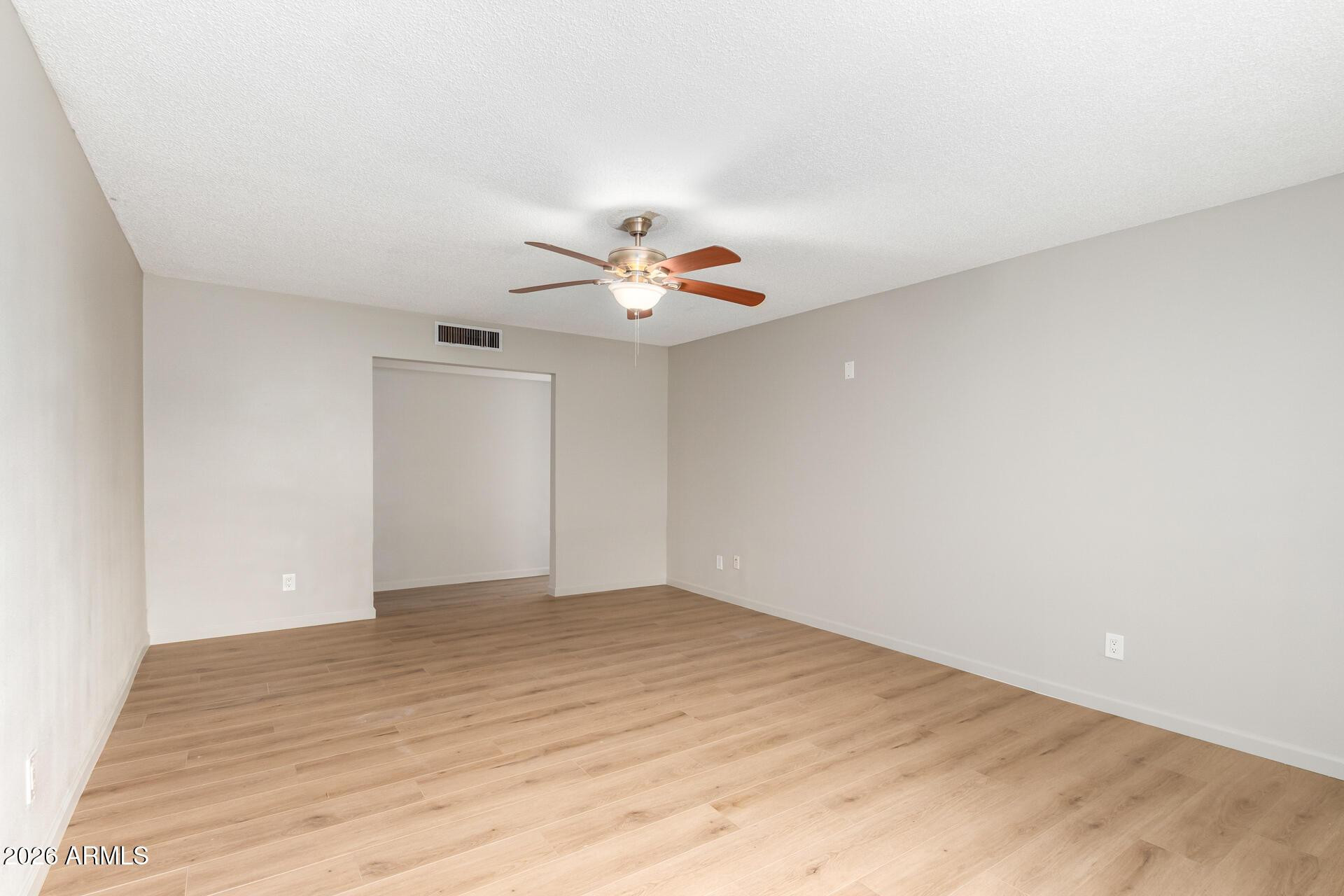103 East Del Rio Drive Tempe, AZ 85282 - Photo 5 of 28 a view of a room with a ceiling fan