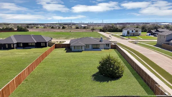 a view of a lake with houses with outdoor space