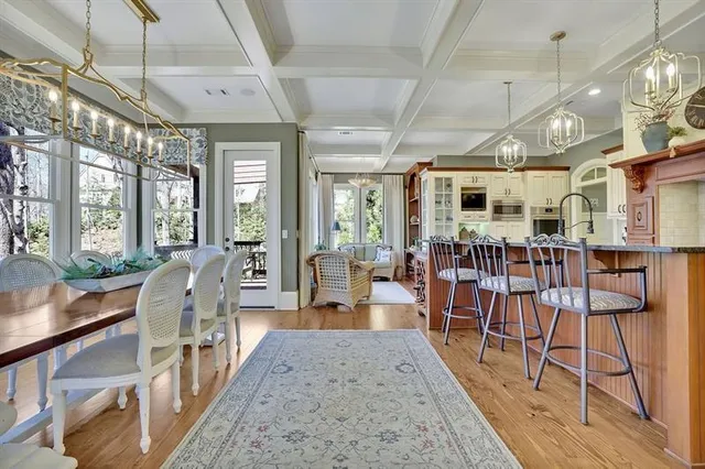 a kitchen with stainless steel appliances granite countertop a stove and cabinets