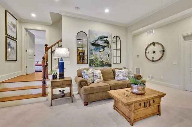 a view of a swimming pool with mountains and a small yard