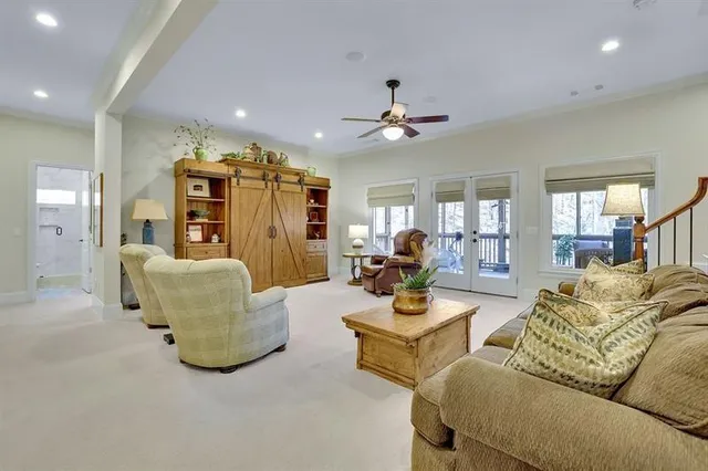 an aerial view of a house with a yard basket ball court