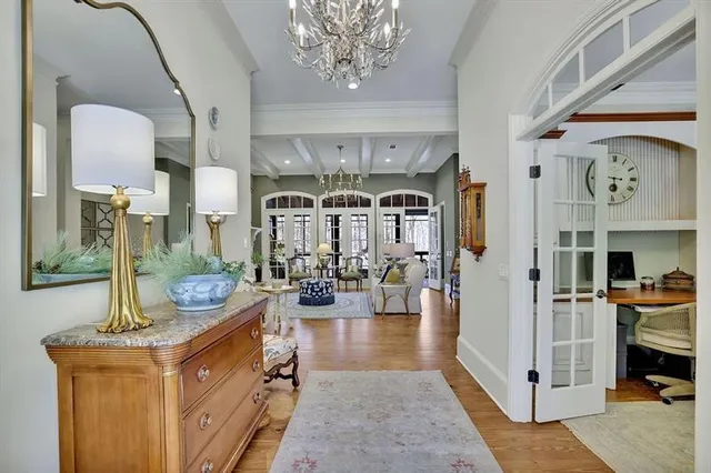 a living room with furniture fireplace and flat screen tv