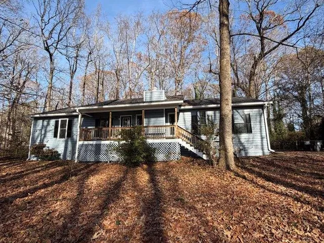a front view of a house with yard