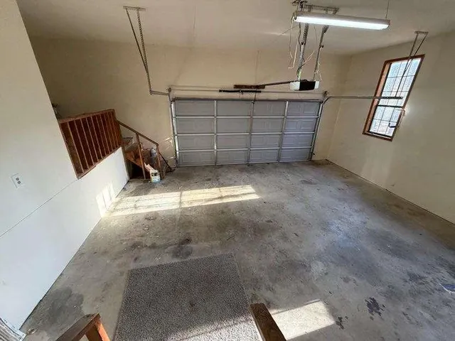 a view of a livingroom with a staircase