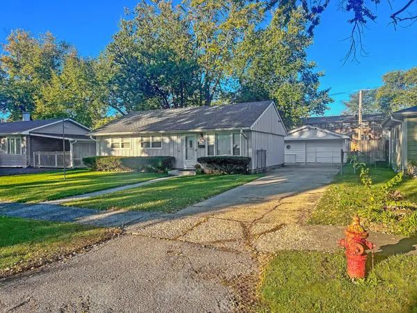 a view of a house with a big yard