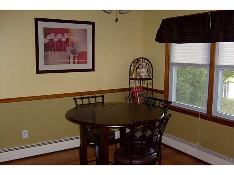 24 Scarborough Road Cumberland, RI 02864 - Photo 8 of 25 Dining Room. Large dining space can accommodate formal furniture if necessary