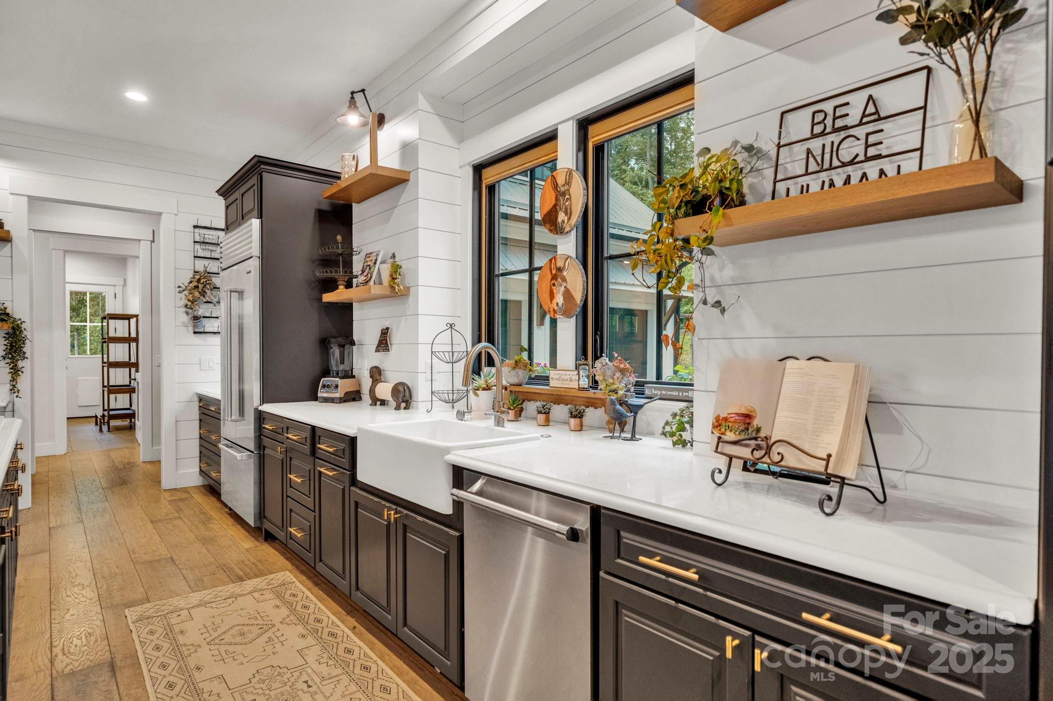 23 Windy Ridge Fairview, NC 28730 - Photo 13 of 47 a kitchen with a sink appliances and cabinets