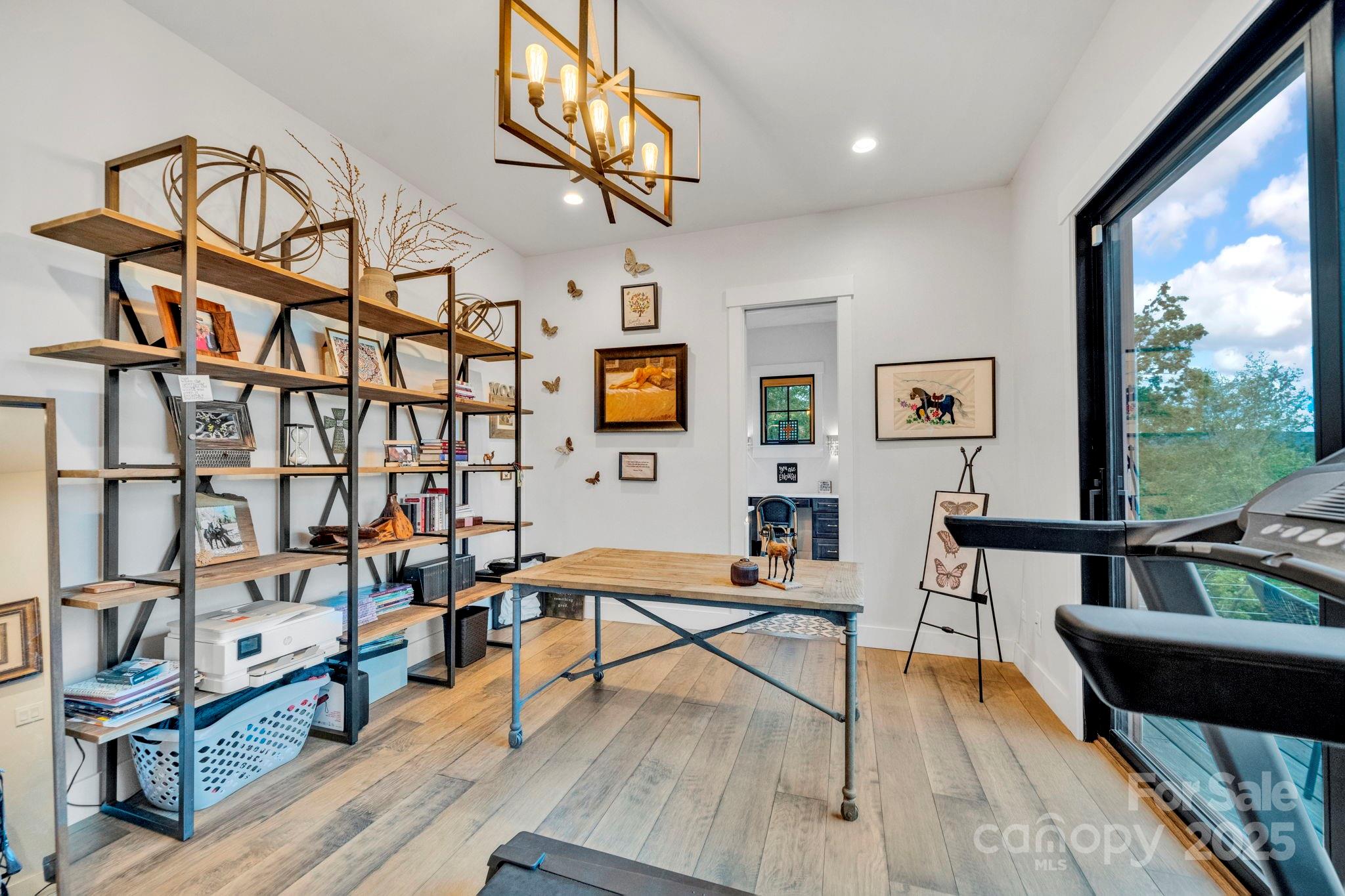 23 Windy Ridge Fairview, NC 28730 - Photo 26 of 47 a living room with furniture and a wooden floor