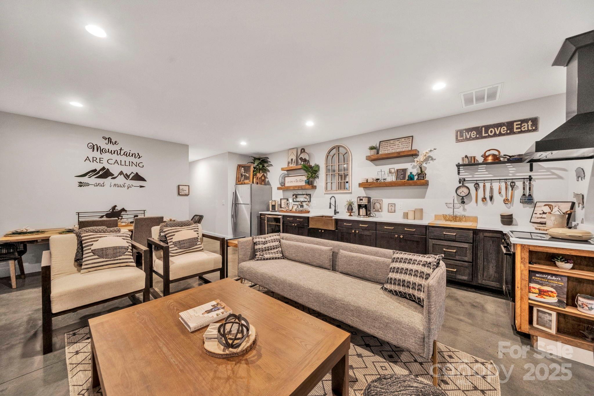 23 Windy Ridge Fairview, NC 28730 - Photo 31 of 47 a living room with furniture and kitchen view