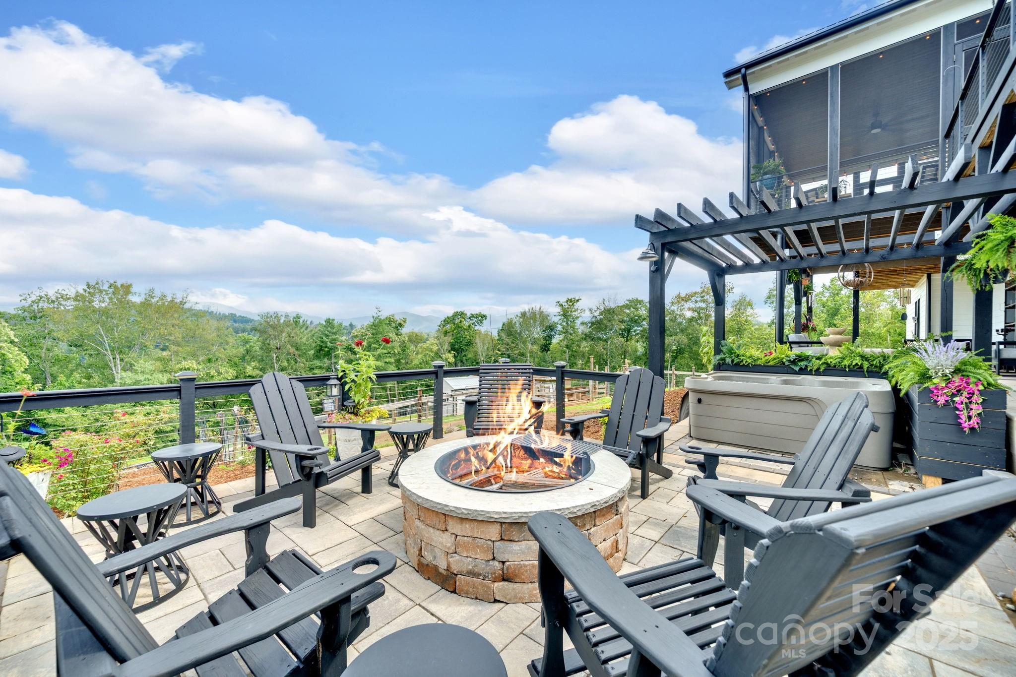 23 Windy Ridge Fairview, NC 28730 - Photo 36 of 47 a view of a patio with couches table and chairs