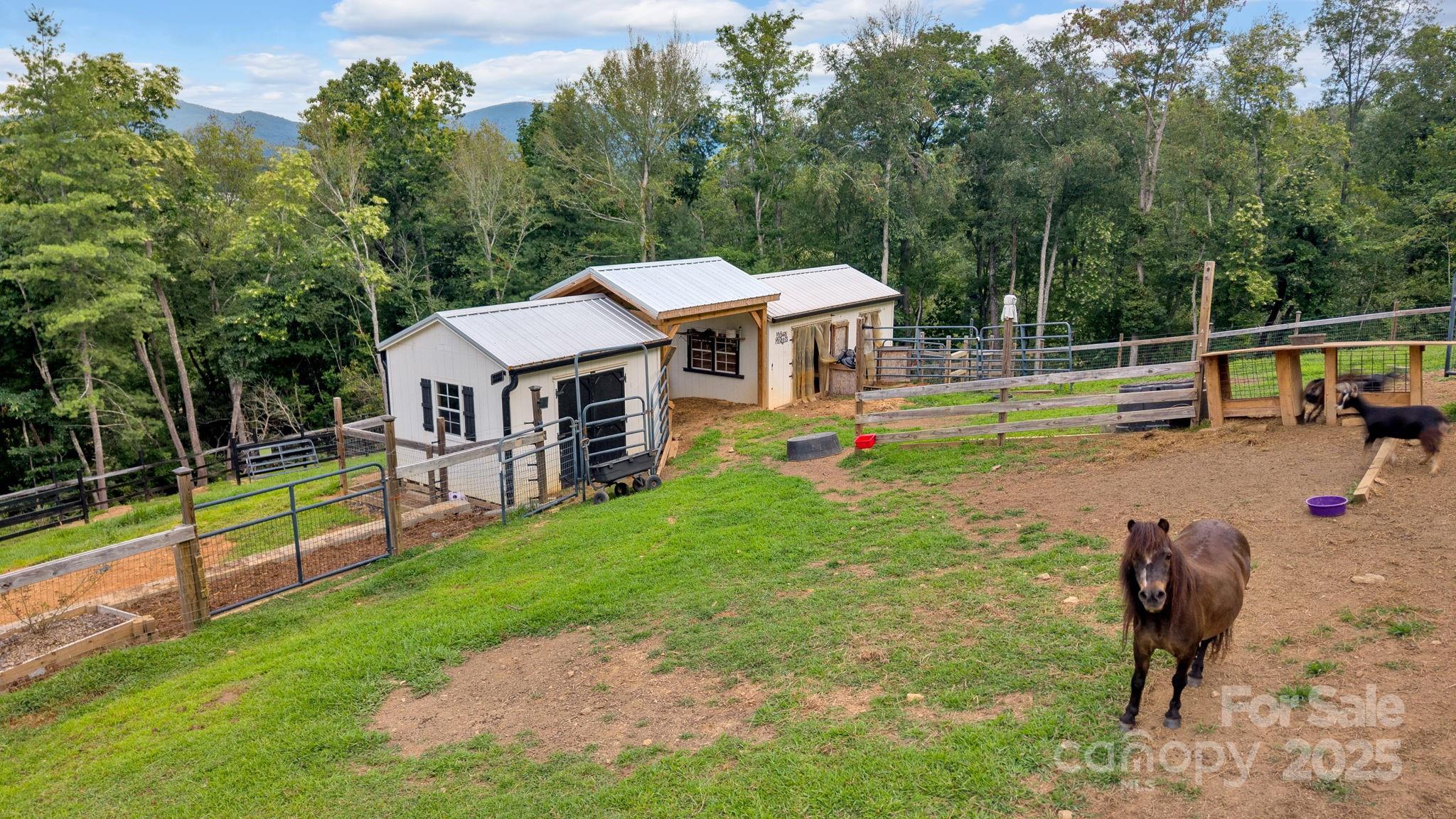 23 Windy Ridge Fairview, NC 28730 - Photo 39 of 47 a view of a house with pool and a yard