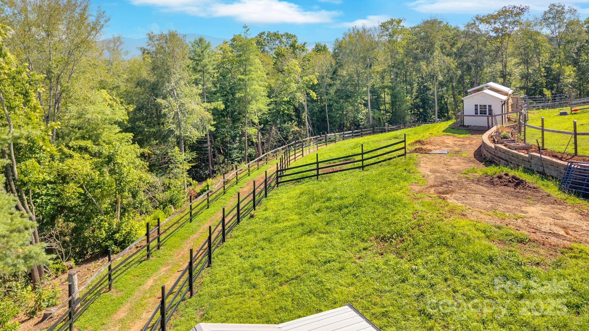 23 Windy Ridge Fairview, NC 28730 - Photo 41 of 47 a view of a yard with swimming pool and trees