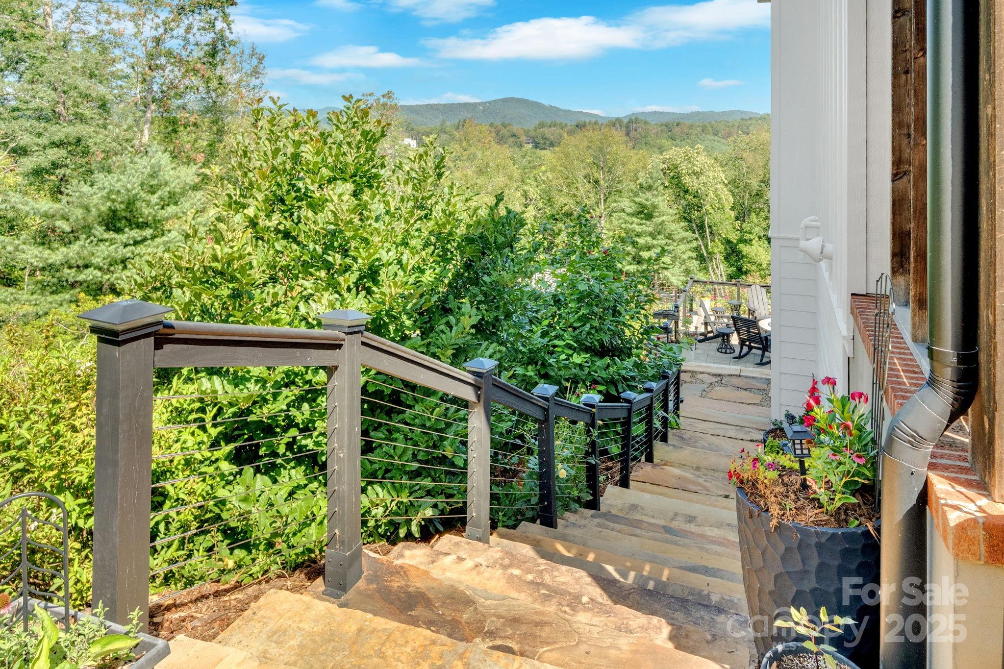 23 Windy Ridge Fairview, NC 28730 - Photo 43 of 47 a view of a balcony with flower plants