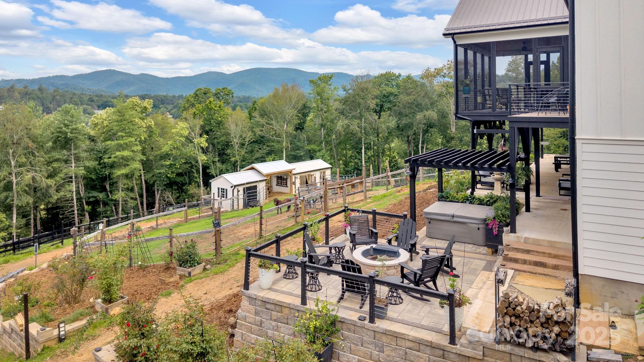 23 Windy Ridge Fairview, NC 28730 - Photo 5 of 47 a view of a patio with iron fence