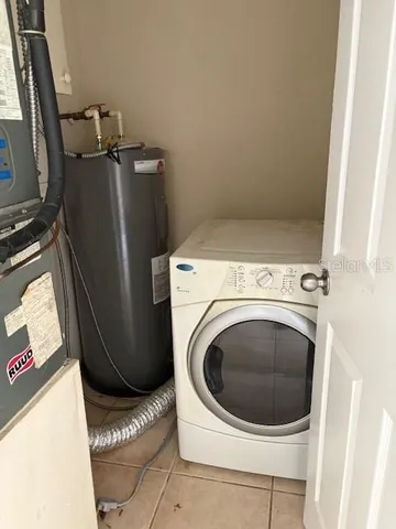 a kitchen with a stove and a microwave