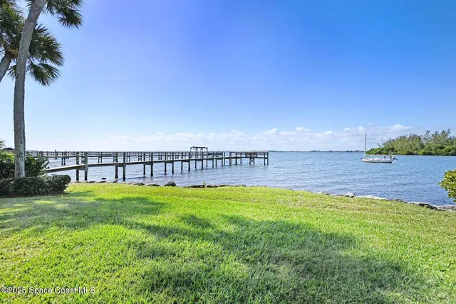 a view of a terrace with yard