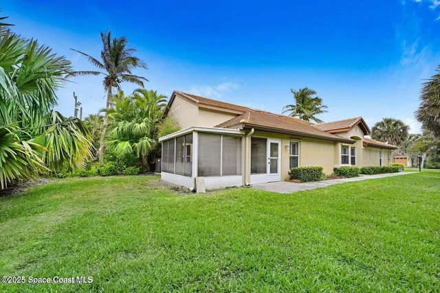 a front view of a house with a yard and porch