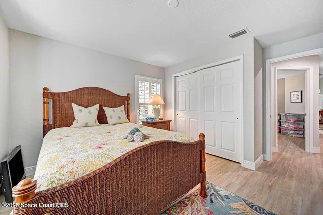 a bed room with a bed and a couch