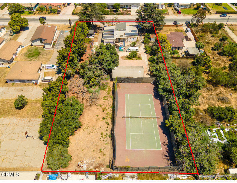 284 East Collins Street Oxnard, CA 93036 - Photo 2 of 18 an aerial view of residential houses with outdoor space