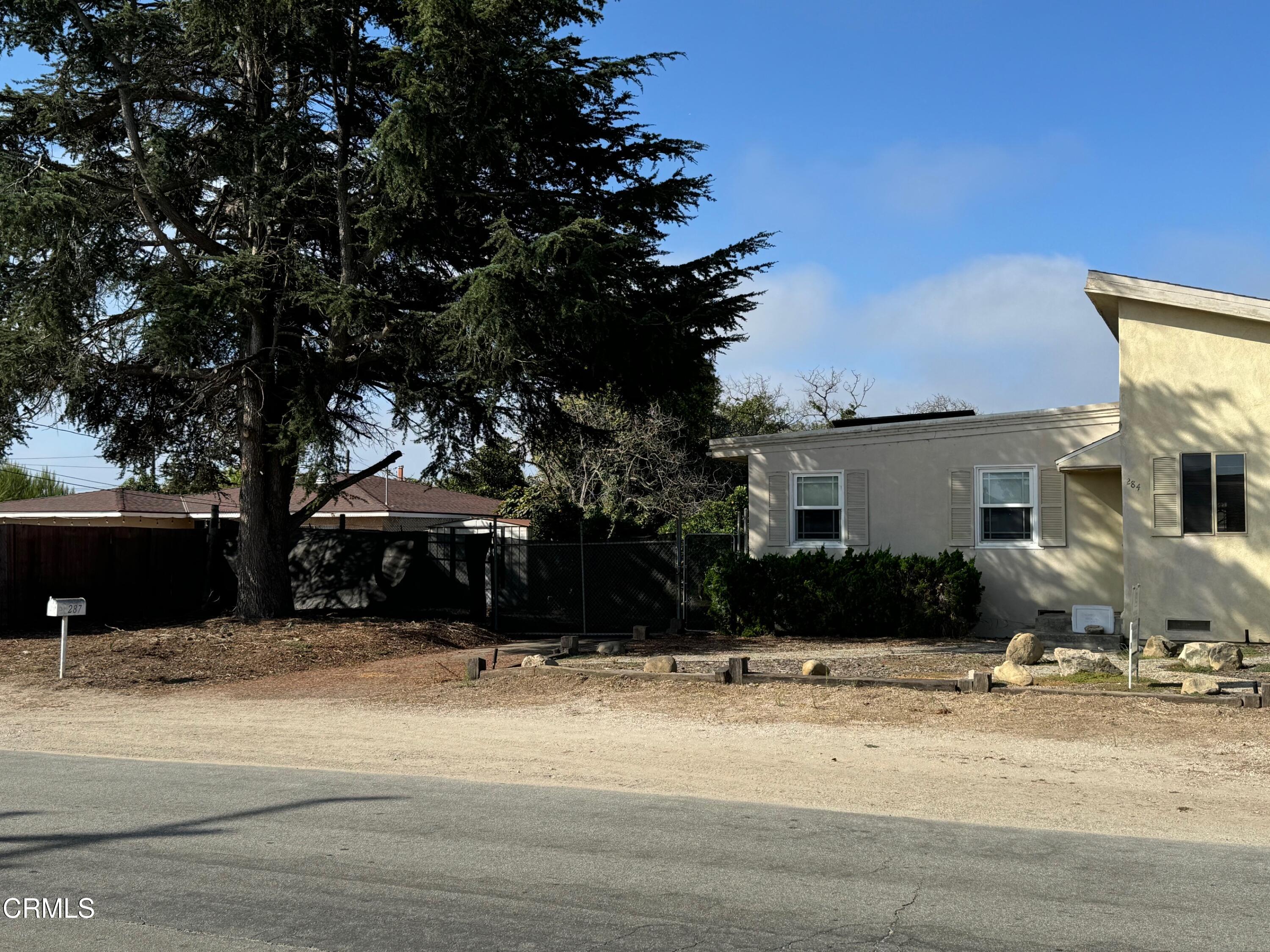 284 East Collins Street Oxnard, CA 93036 - Photo 5 of 18 a view of a house with a yard