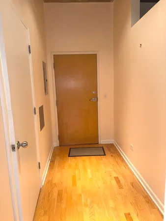 a view of a big room with windows