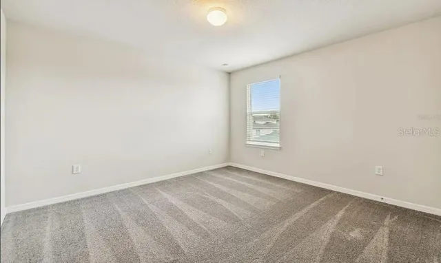 an empty room with a window