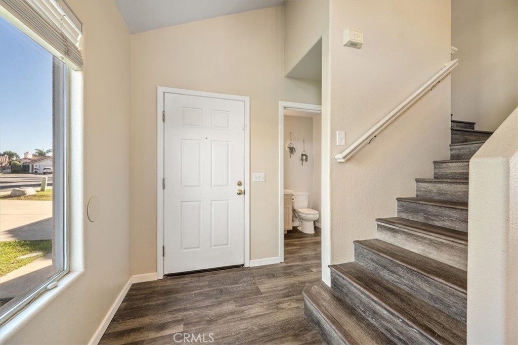 1306 Avenida Pelicanos Oceano, CA 93445 - Photo 11 of 39 a view of a hallway with wooden floor and entryway