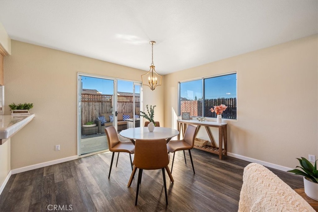 1306 Avenida Pelicanos Oceano, CA 93445 - Photo 7 of 39 a dining room with furniture window and wooden floor