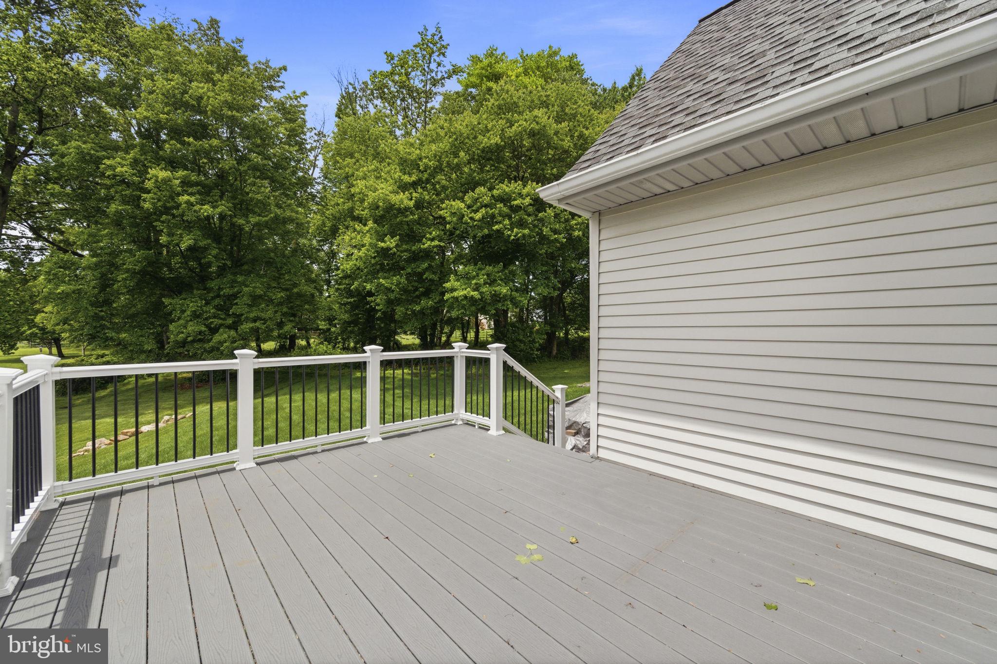 736 Letitia Drive Hockessin, DE 19707 - Photo 74 of 92 a view of balcony with deck and wooden floor