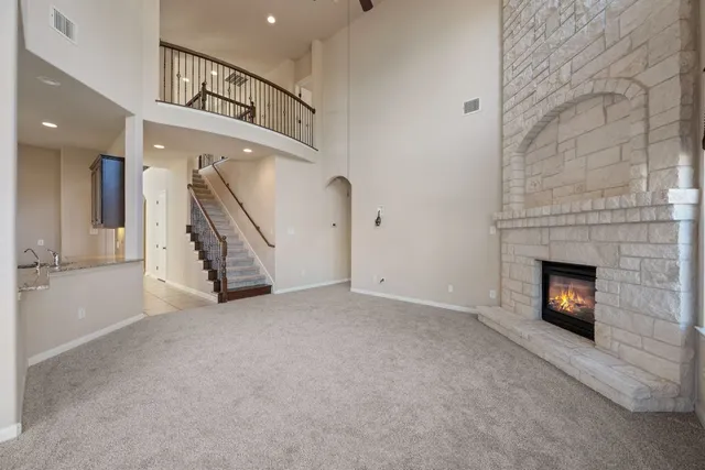 an empty room with a mirror