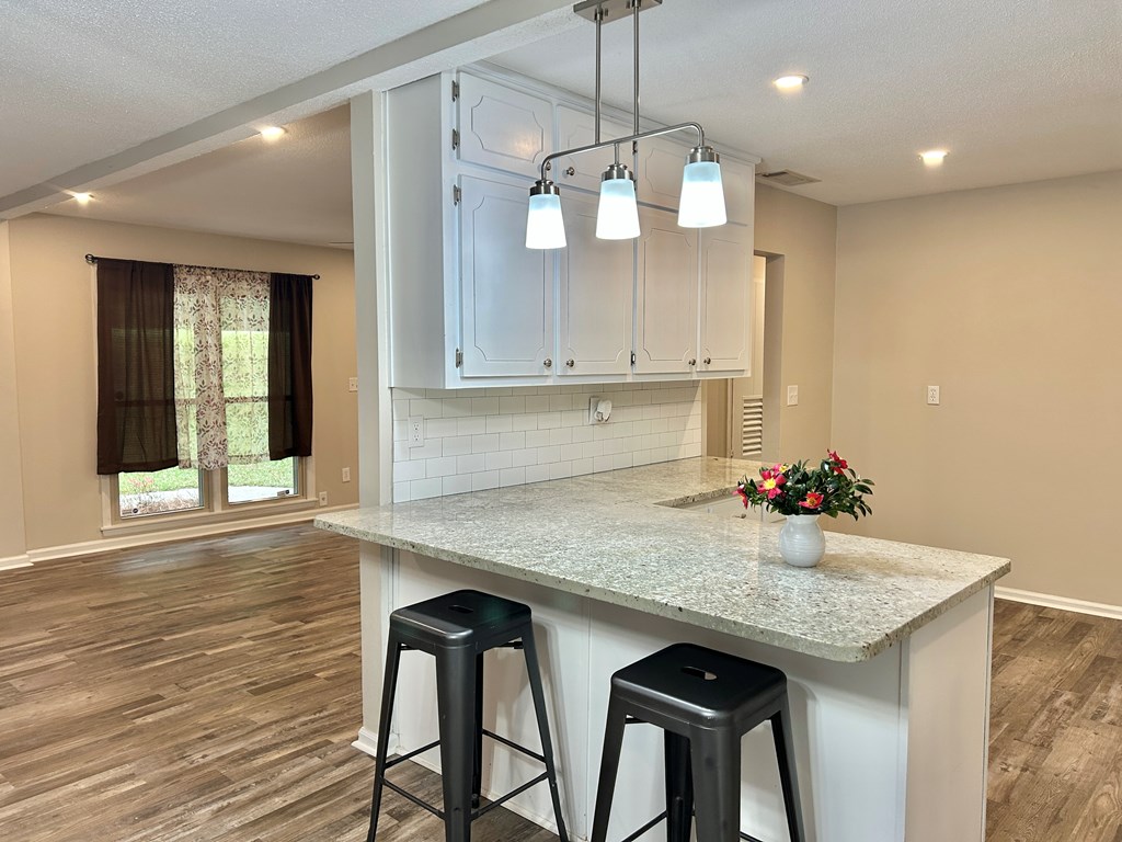 5636 Webb Avenue Columbus, GA 31909 - Photo 12 of 52 a kitchen with a table and chairs in it