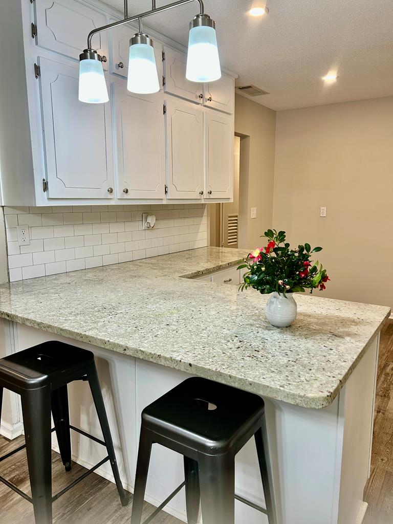 5636 Webb Avenue Columbus, GA 31909 - Photo 15 of 52 a kitchen with a table and chairs in it