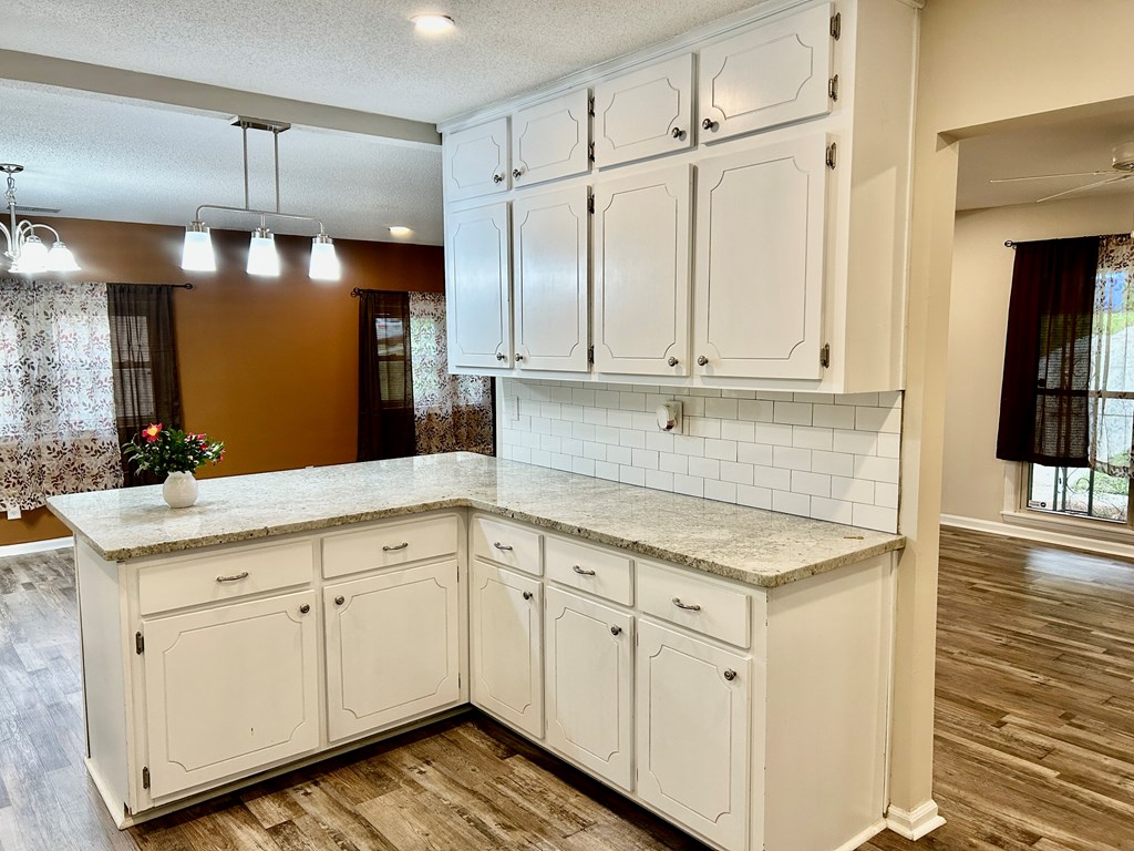 5636 Webb Avenue Columbus, GA 31909 - Photo 17 of 52 a kitchen with white cabinets and sink