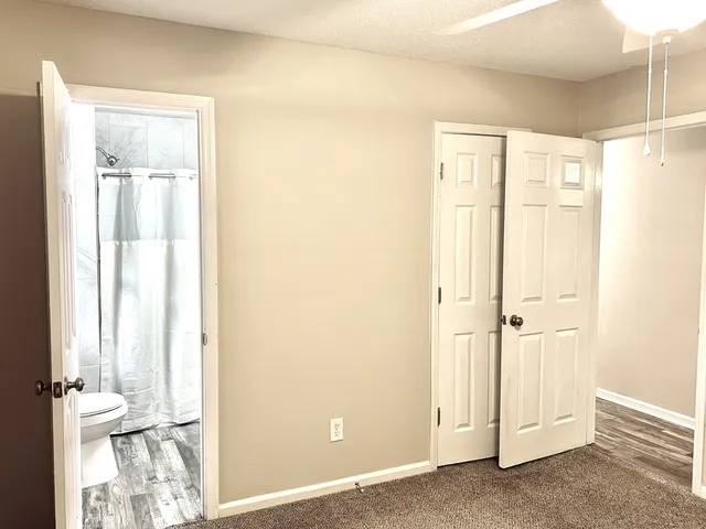an entryway with wooden floor