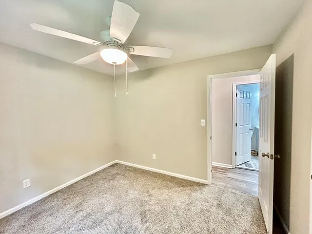 a bathroom with a toilet sink and tub