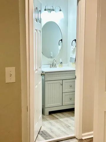 a bathroom with a shower curtain a bathtub and a shower