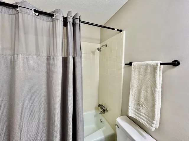 a view of a livingroom with wooden floor