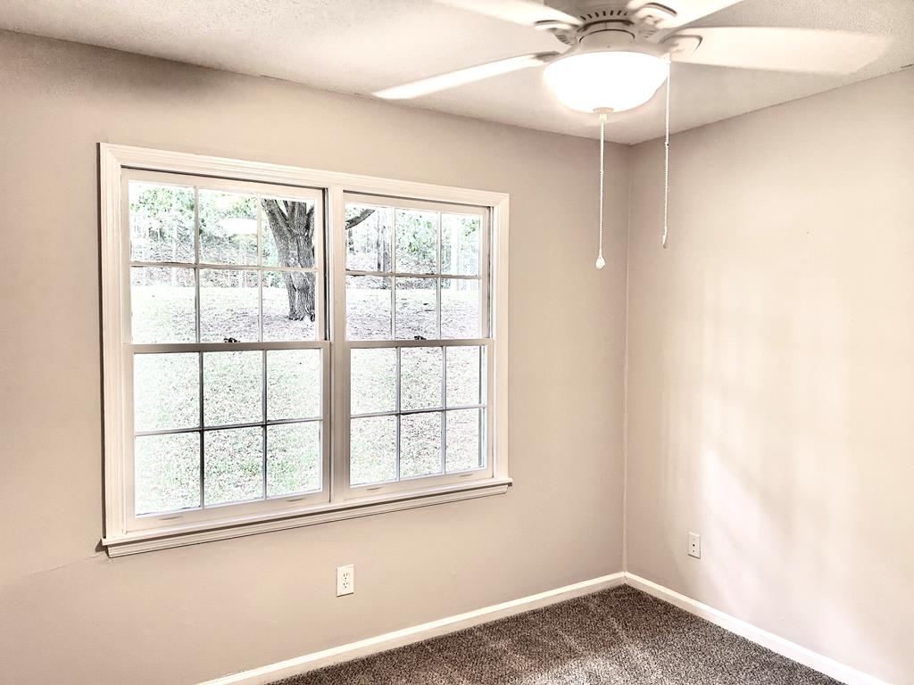 5636 Webb Avenue Columbus, GA 31909 - Photo 43 of 52 an empty room with a window and a fan