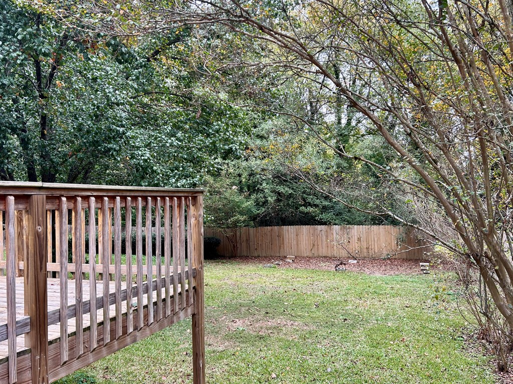 5636 Webb Avenue Columbus, GA 31909 - Photo 47 of 52 a view of small backyard with small cabin and wooden fence