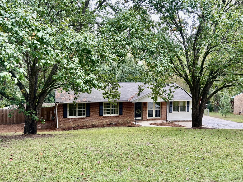 5636 Webb Avenue Columbus, GA 31909 - Photo 48 of 52 a front view of a house with a garden